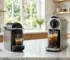 Две капсульные кофемашины Nespresso на мраморной столешнице с айс-латте